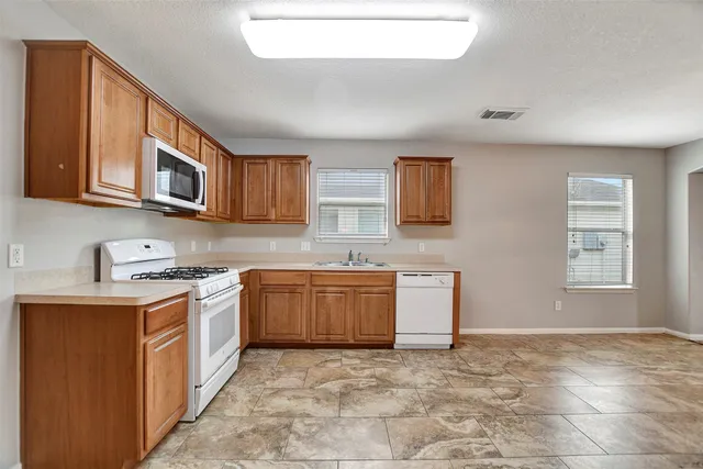 $1,695 | 12319 Chute Forest Court, Houston, TX 77014