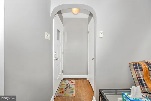 a view of a bedroom from a hallway