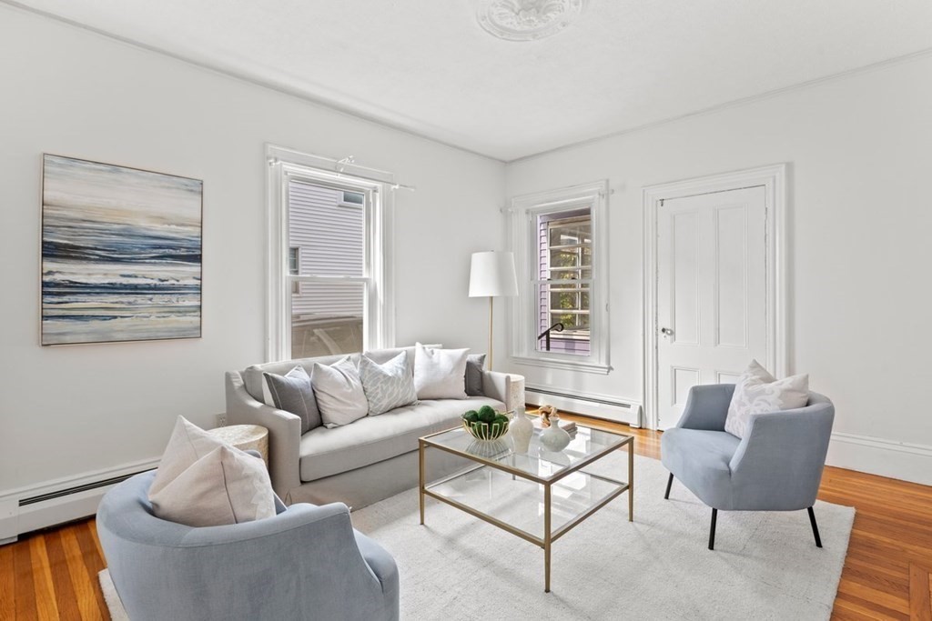 21 Boardman Street, Unit 1 Salem, MA 01970 - Photo 3 of 19 a living room with furniture and a window