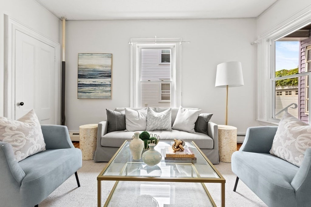 21 Boardman Street, Unit 1 Salem, MA 01970 - Photo 5 of 19 a living room with furniture and a window