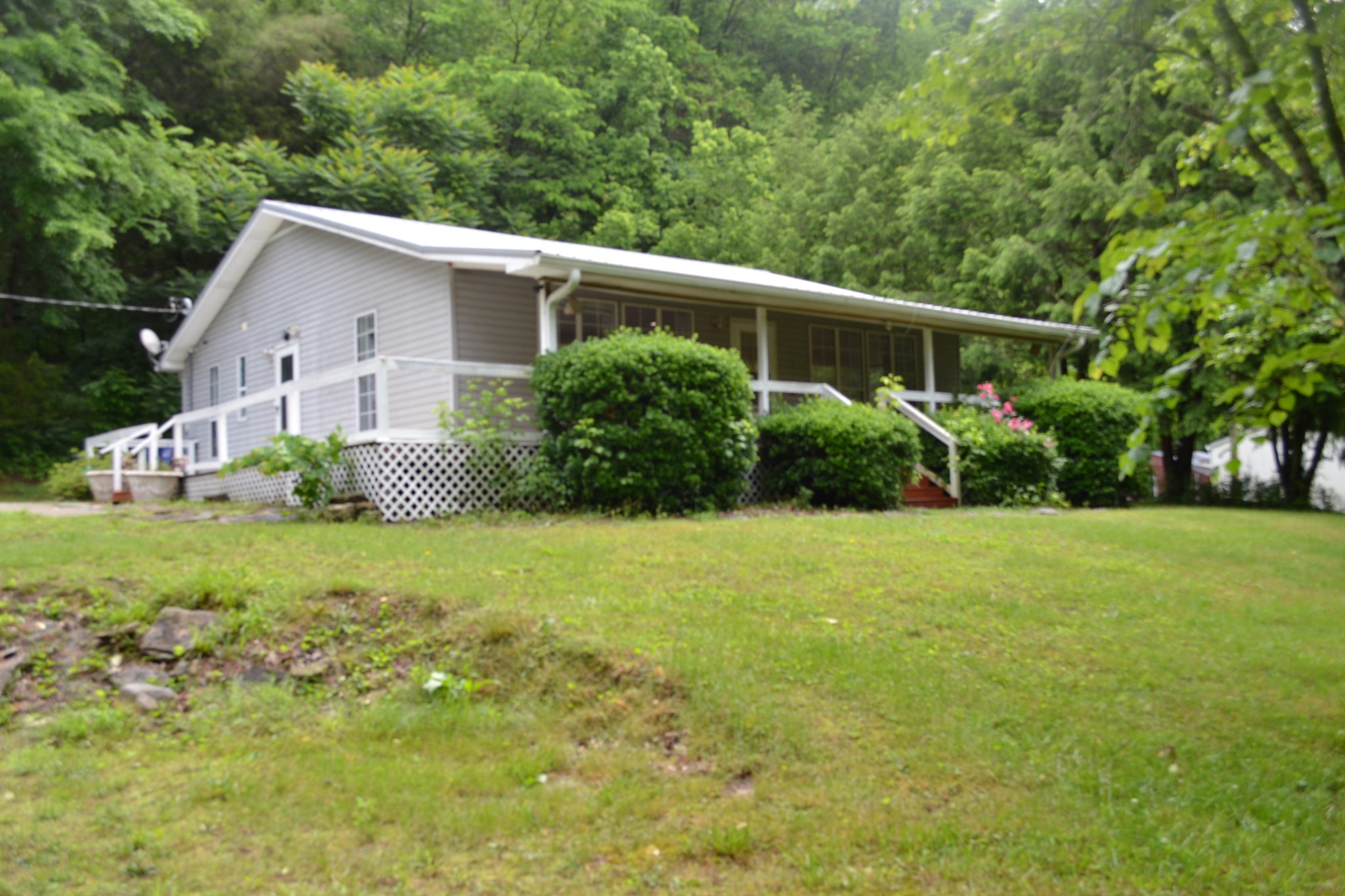 1505 Add Stafford Road Hilham, TN 38568 - Photo 39 of 65 a view of a house with backyard and garden