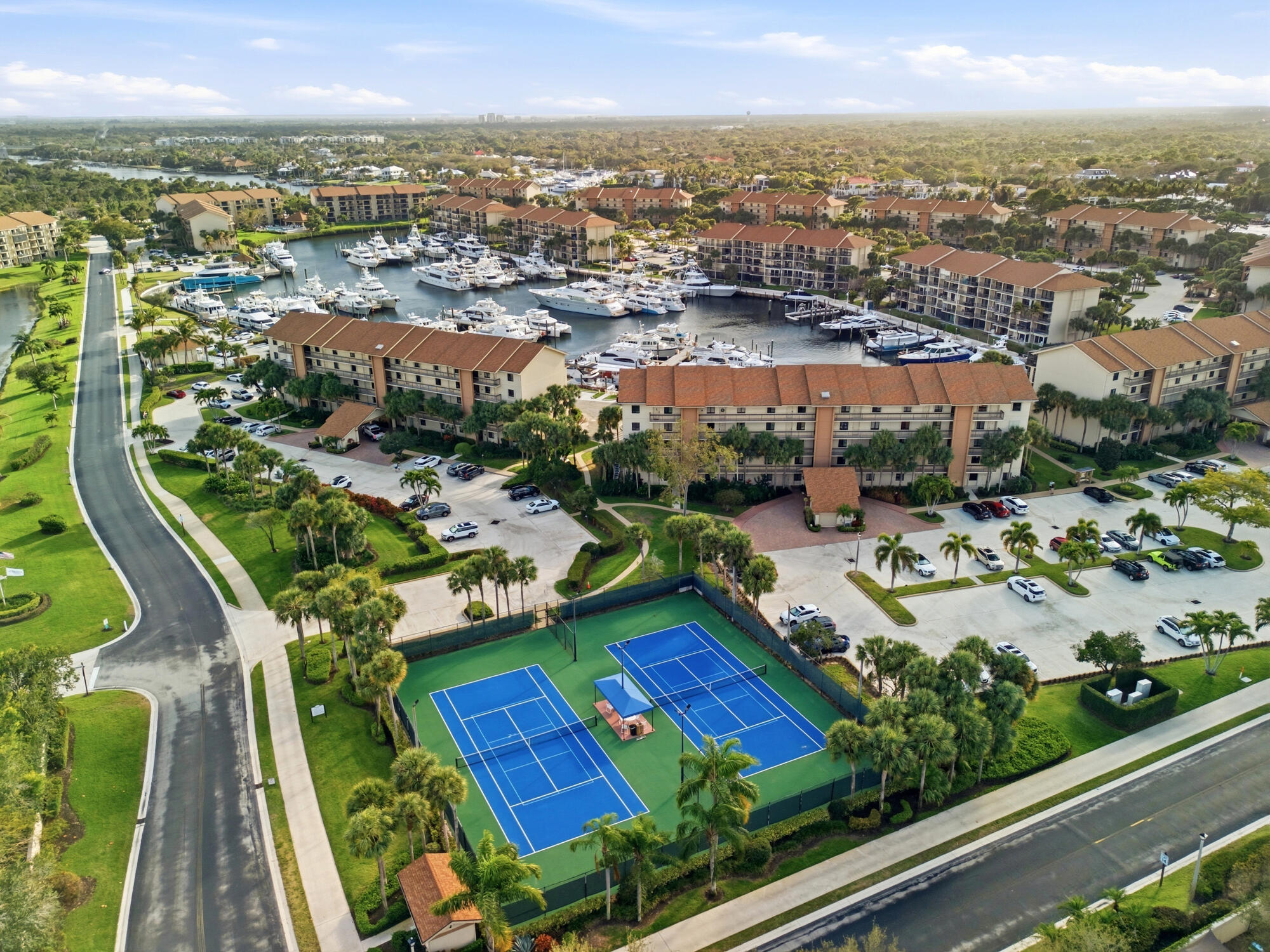 2101 Marina Isle Way, Unit 404 Jupiter, FL 33477 - Photo 15 of 17 an aerial view of residential houses with outdoor space