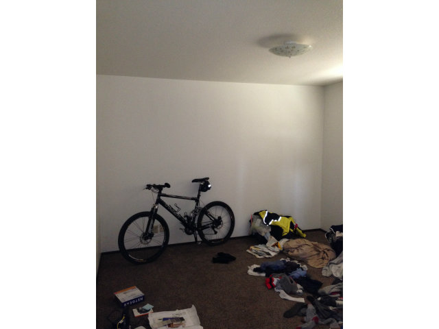 1198 Amesti Road, Unit A Corralitos, CA 95076 - Photo 8 of 15 a view of a room with rack on the wall and a window