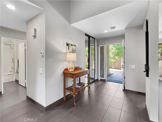 a view of a furniture in a room with a window