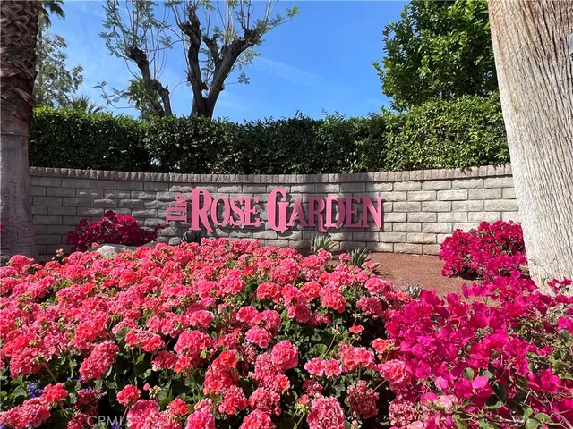 a view of yard with tree and wooden fence