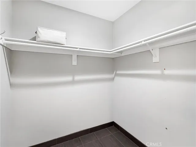 a view of an empty walk in closet