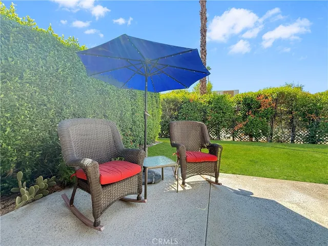 a chair and a table in the garden