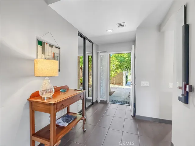 a room with a bed and a window