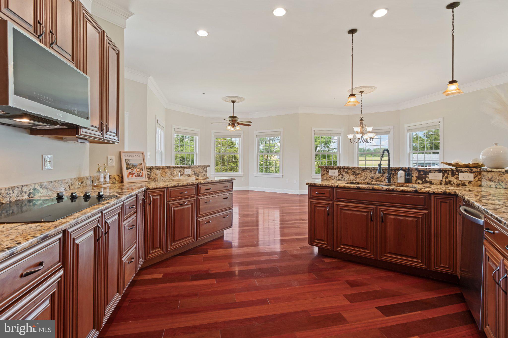 7147 Linganore Road New Market, MD 21774 - Photo 8 of 44 Elegant kitchen with rich wood tones.