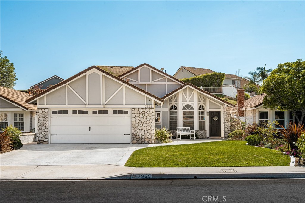 7958 East Bauer Road Anaheim, CA 92808 - Photo 1 of 45 front view of a house with a yard