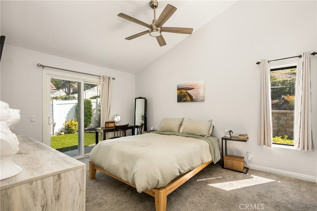 7958 East Bauer Road Anaheim, CA 92808 - Photo 21 of 45 a bedroom with a bed and a table