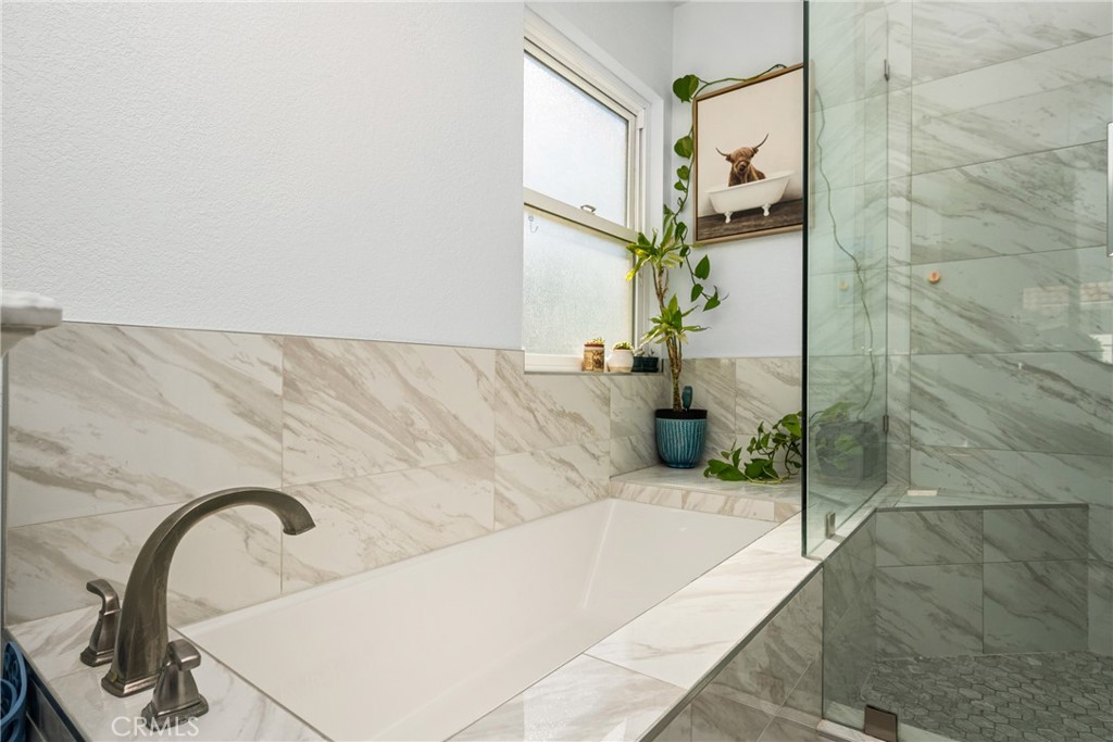 7958 East Bauer Road Anaheim, CA 92808 - Photo 26 of 45 a bath tub sitting next to a bathroom