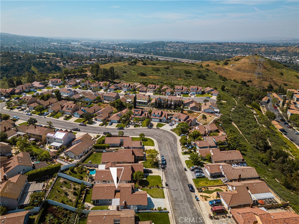 7958 East Bauer Road Anaheim, CA 92808 - Photo 43 of 45 an aerial view of a city with lots of residential buildings