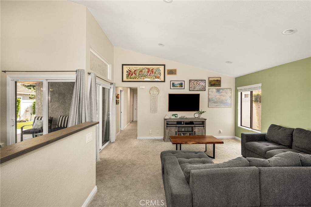 7958 East Bauer Road Anaheim, CA 92808 - Photo 7 of 45 a living room with furniture and a flat screen tv