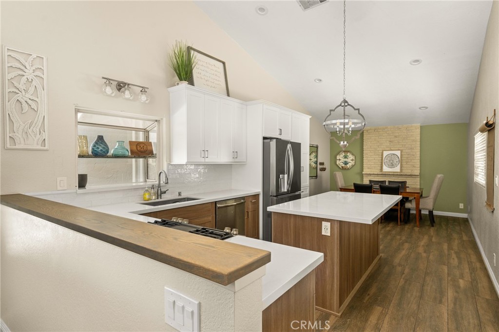 7958 East Bauer Road Anaheim, CA 92808 - Photo 9 of 45 a kitchen with sink and refrigerator