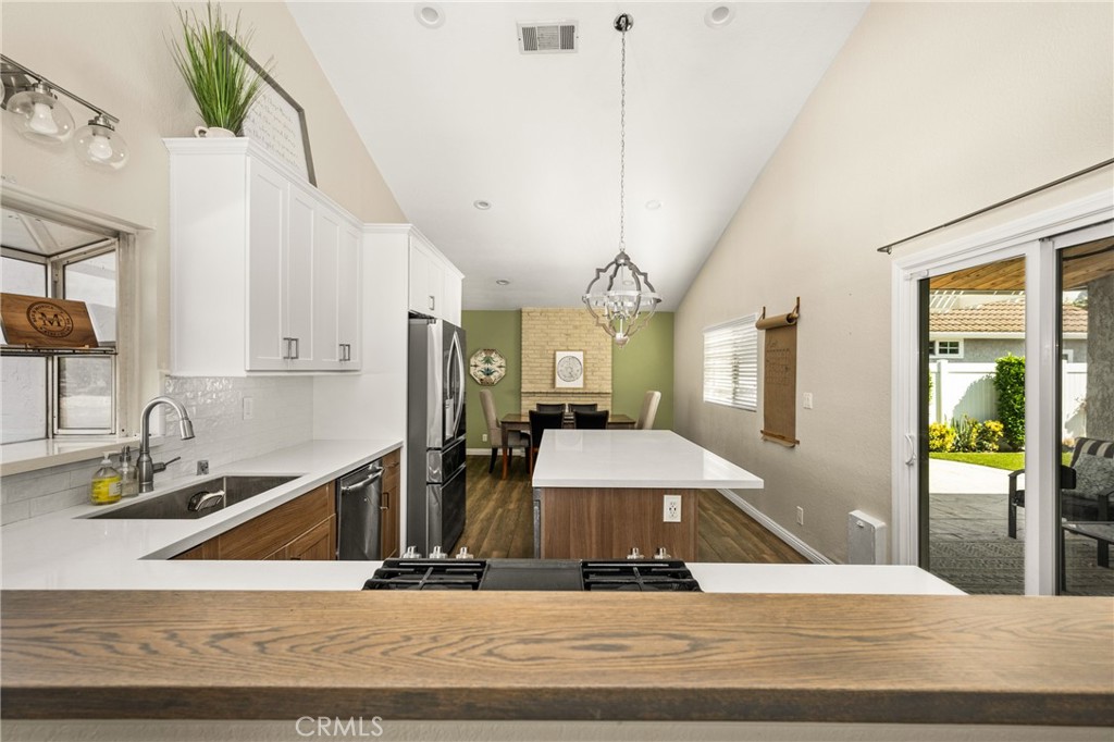 7958 East Bauer Road Anaheim, CA 92808 - Photo 10 of 45 a room with lots of table and chairs