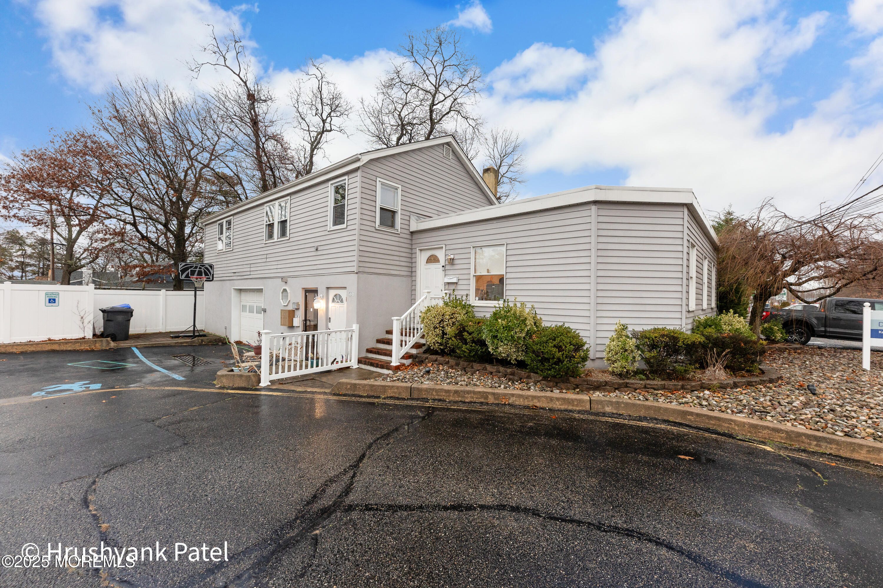 Mantoloking Road Brick, NJ 08723 - Photo 2 of 24 a view of a house with a street
