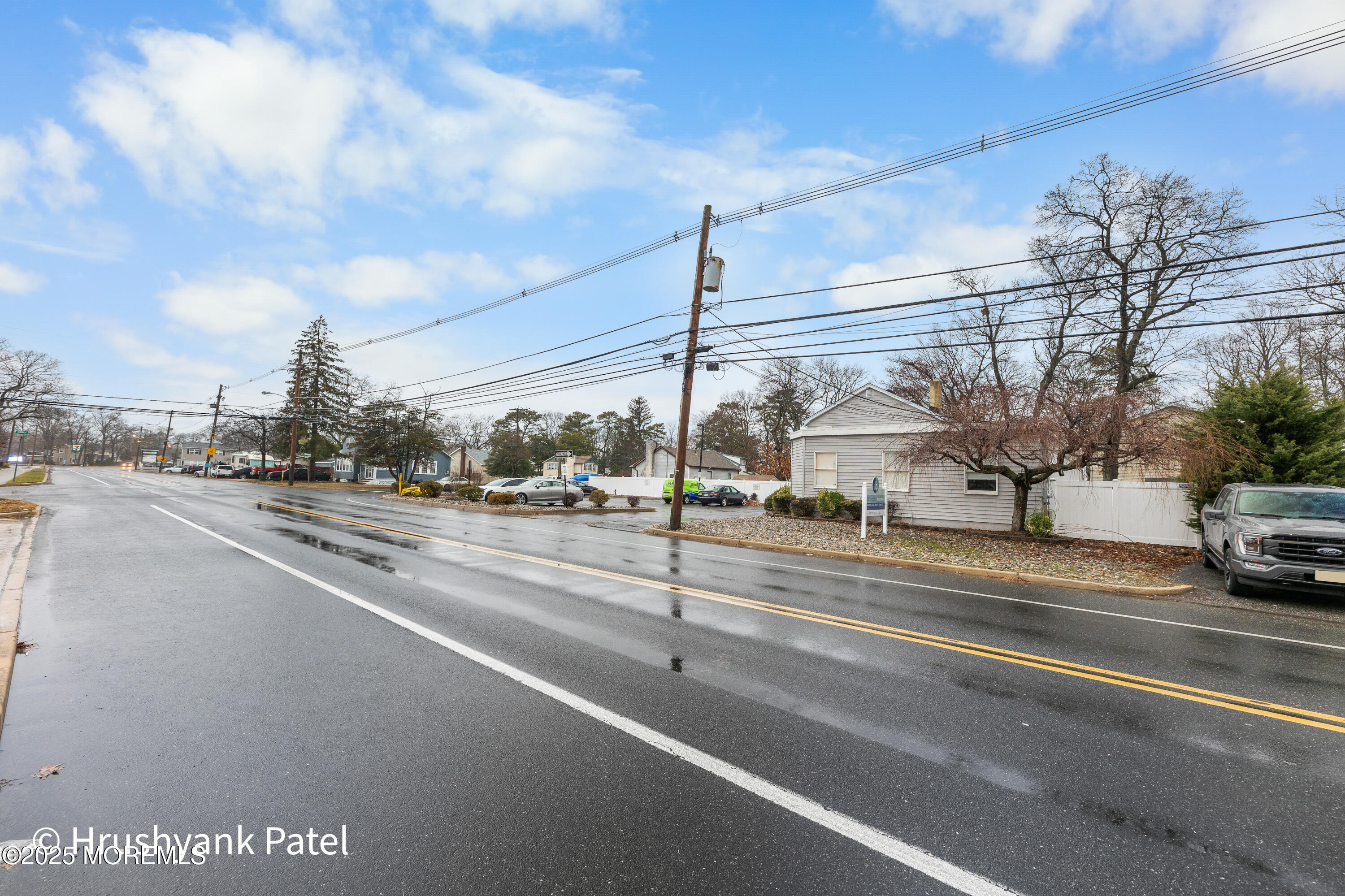 Mantoloking Road Brick, NJ 08723 - Photo 21 of 24 a view of a city street from a building