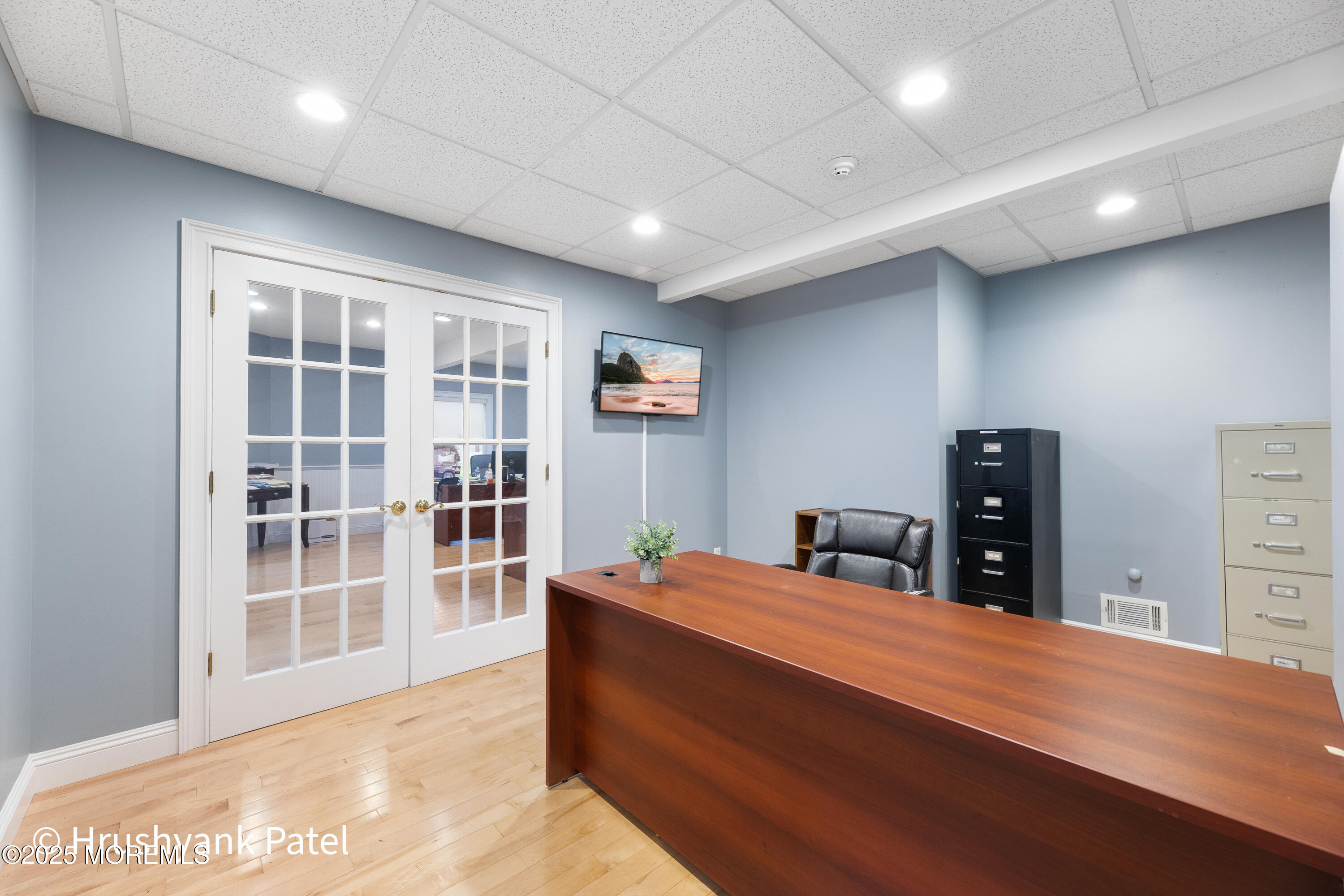 Mantoloking Road Brick, NJ 08723 - Photo 7 of 24 a room with a bed and wooden floor