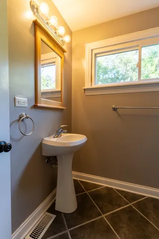 a view of a big room with windows and closet