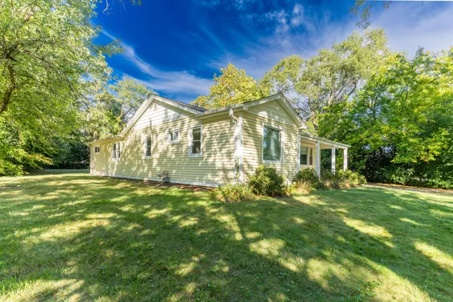 a view of a big yard next to a house