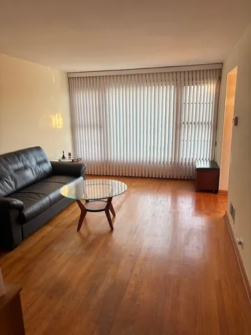 a view of a livingroom with furniture and a couch