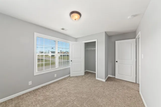 a bathroom with a sink toilet tub and shower