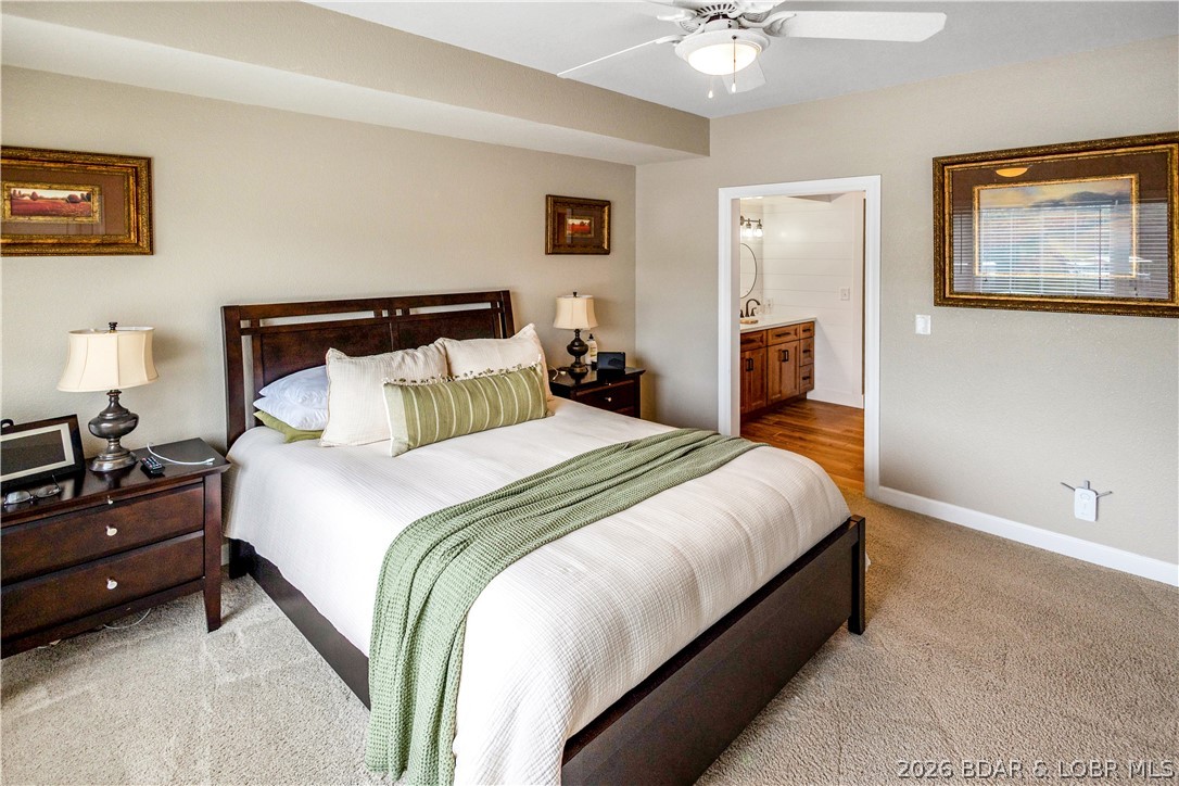 68 Lighthouse Road, Unit 121 Lake Ozark, MO 65049 - Photo 8 of 30 Master bedroom.