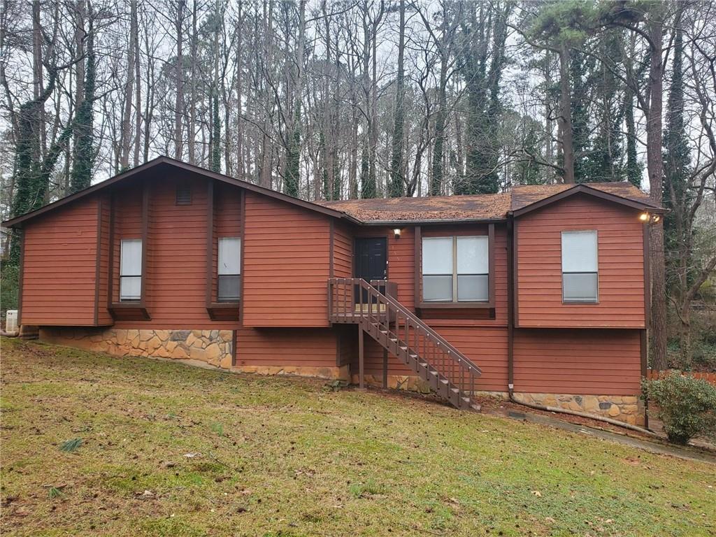 355 Ridgemont Drive Lawrenceville, GA 30046 - Photo 1 of 1 a house with a yard