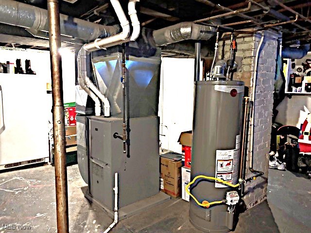 265 Sexton Street Struthers, OH 44471 - Photo 16 of 17 Utilities with gas water heater and heating unit
