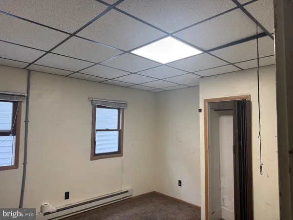 a view of a window in an empty room