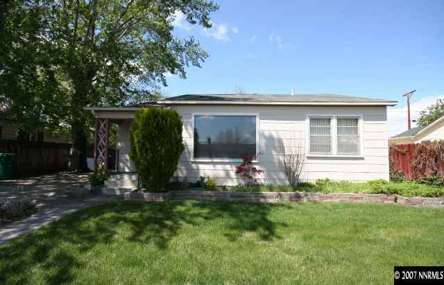 1663 Watt Street Reno, NV 89509 - Photo 1 of 7 a view of a house with backyard and garden