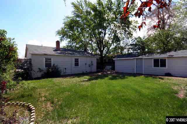 1663 Watt Street Reno, NV 89509 - Photo 2 of 7 a view of a back yard of the house