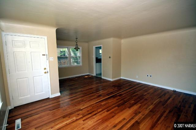 1663 Watt Street Reno, NV 89509 - Photo 3 of 7 a view of a hallway with wooden floor