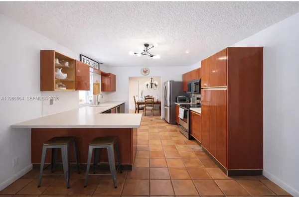 $935,000 | 7355 Poinciana Court, Miami Lakes, FL 33014