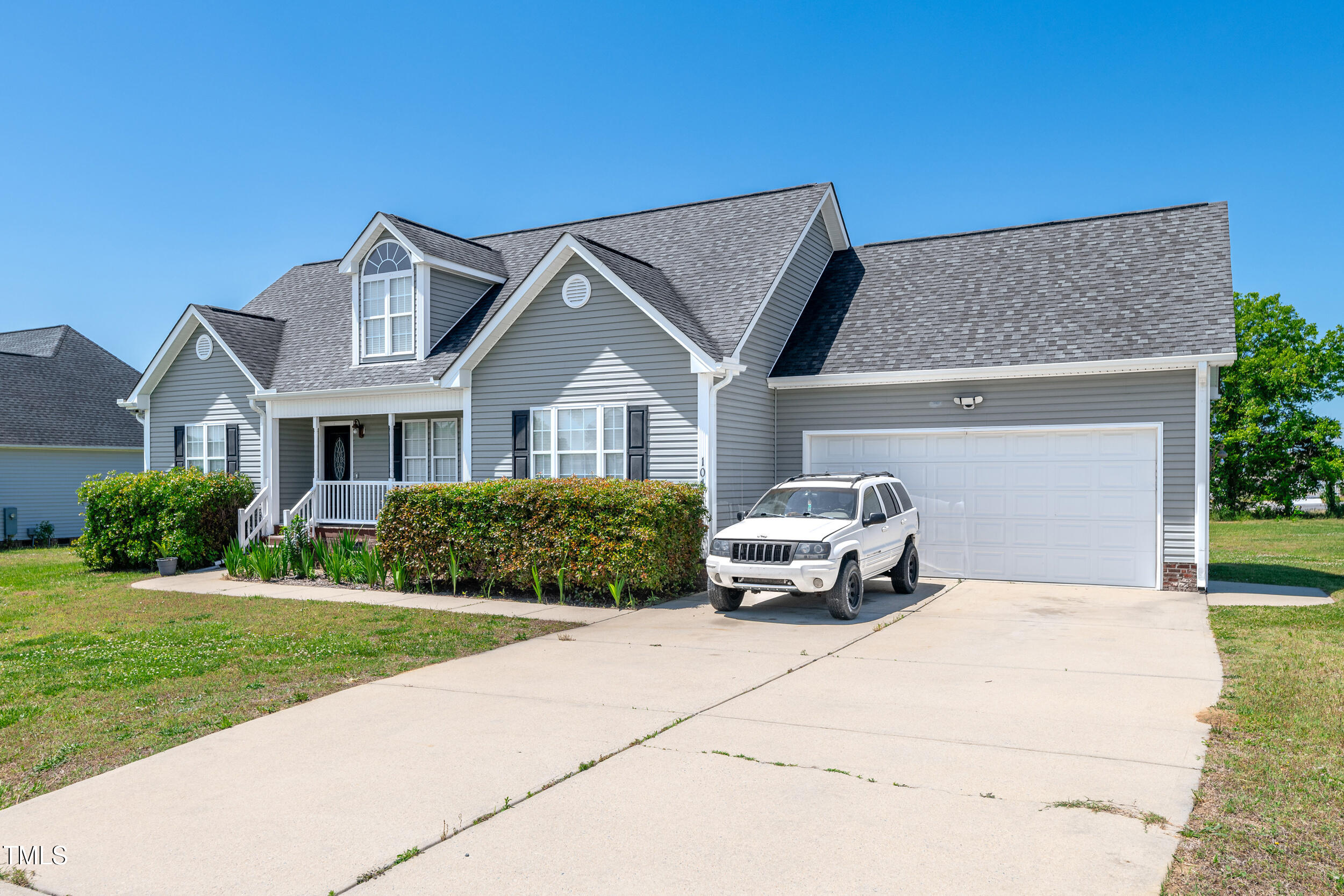 104 JJ Drive Benson, NC 27504 - Photo 15 of 20 a house view with a garden space