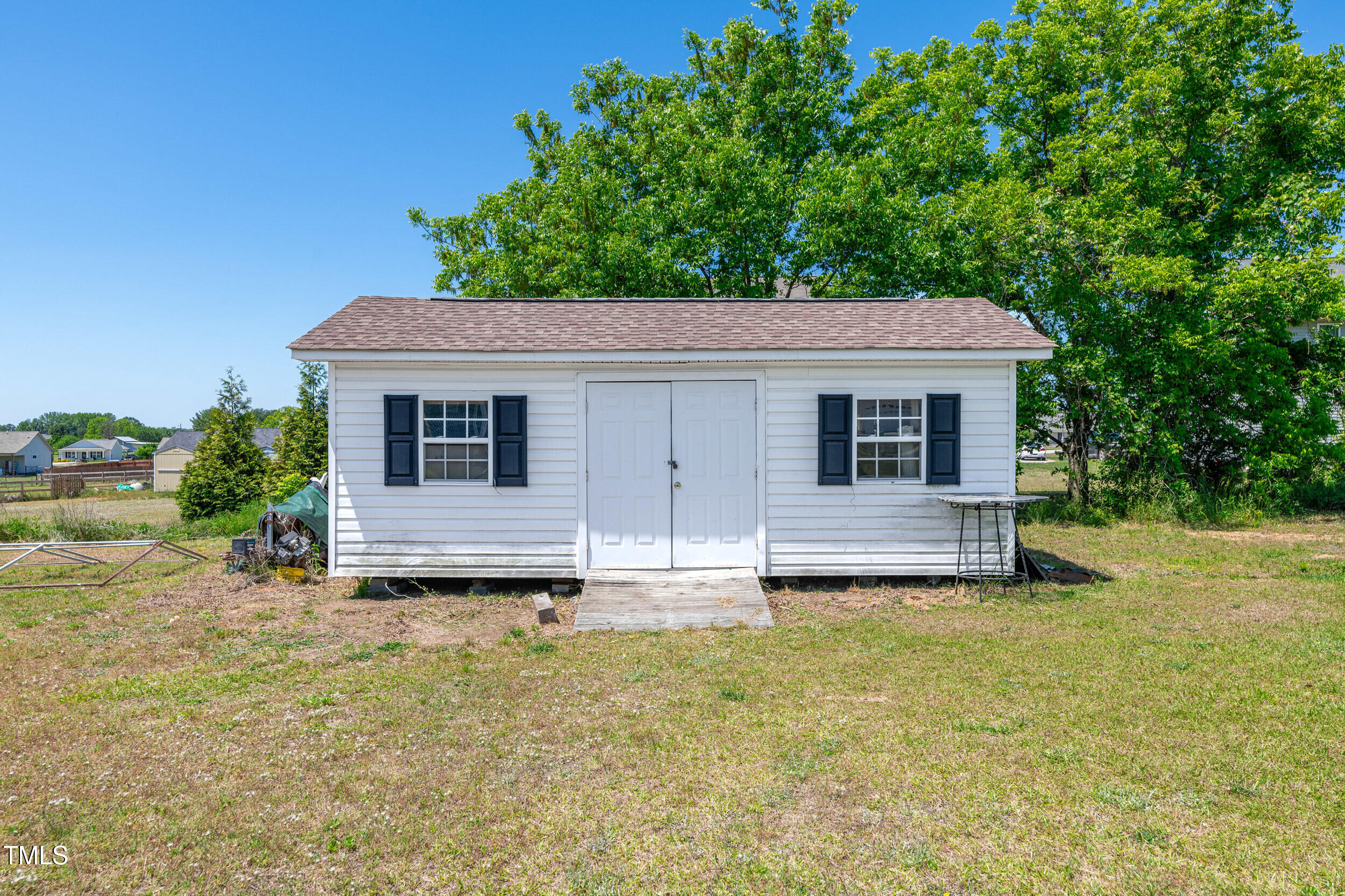 104 JJ Drive Benson, NC 27504 - Photo 16 of 20 front view of a house with a yard