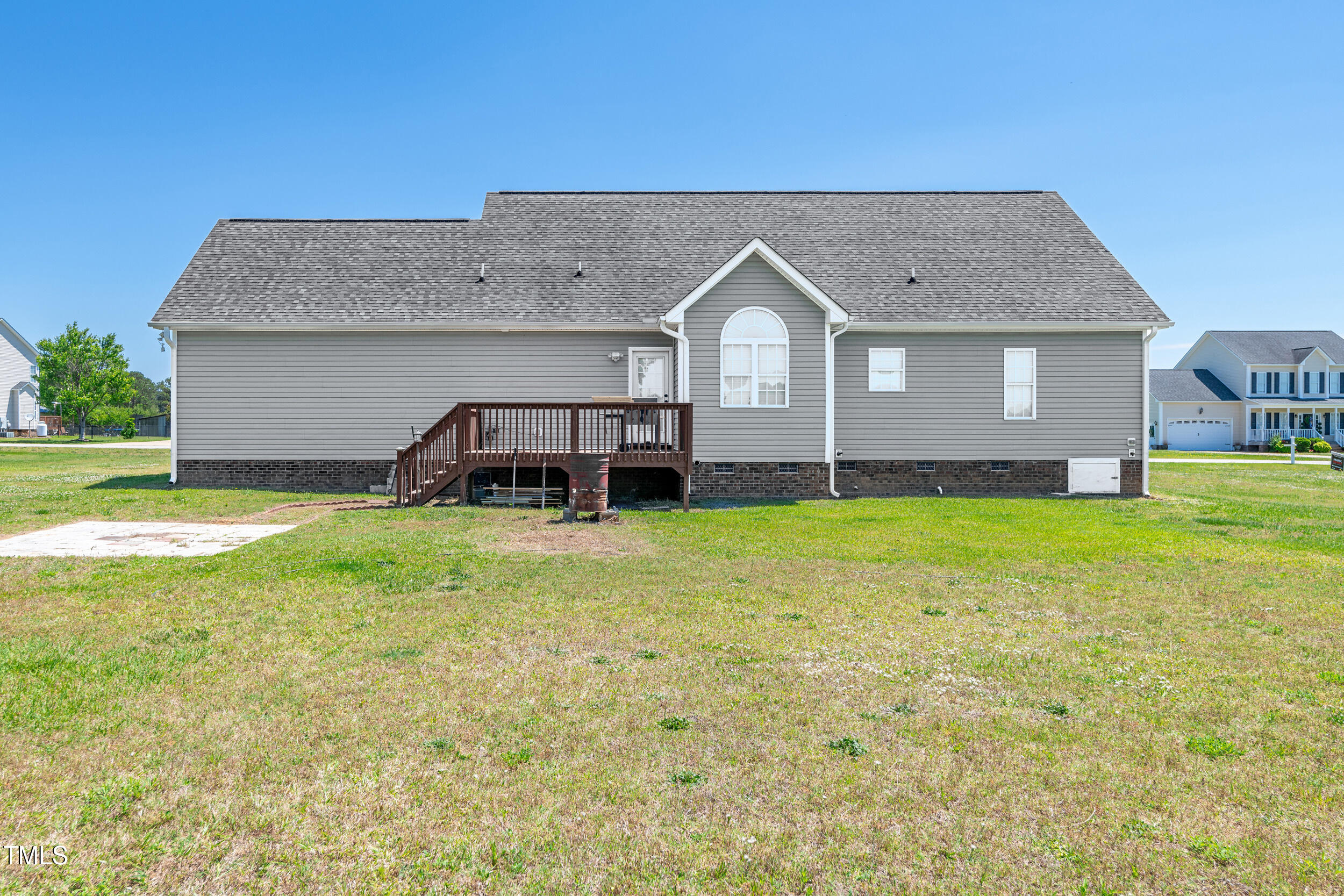 104 JJ Drive Benson, NC 27504 - Photo 17 of 20 a front view of a house with a yard