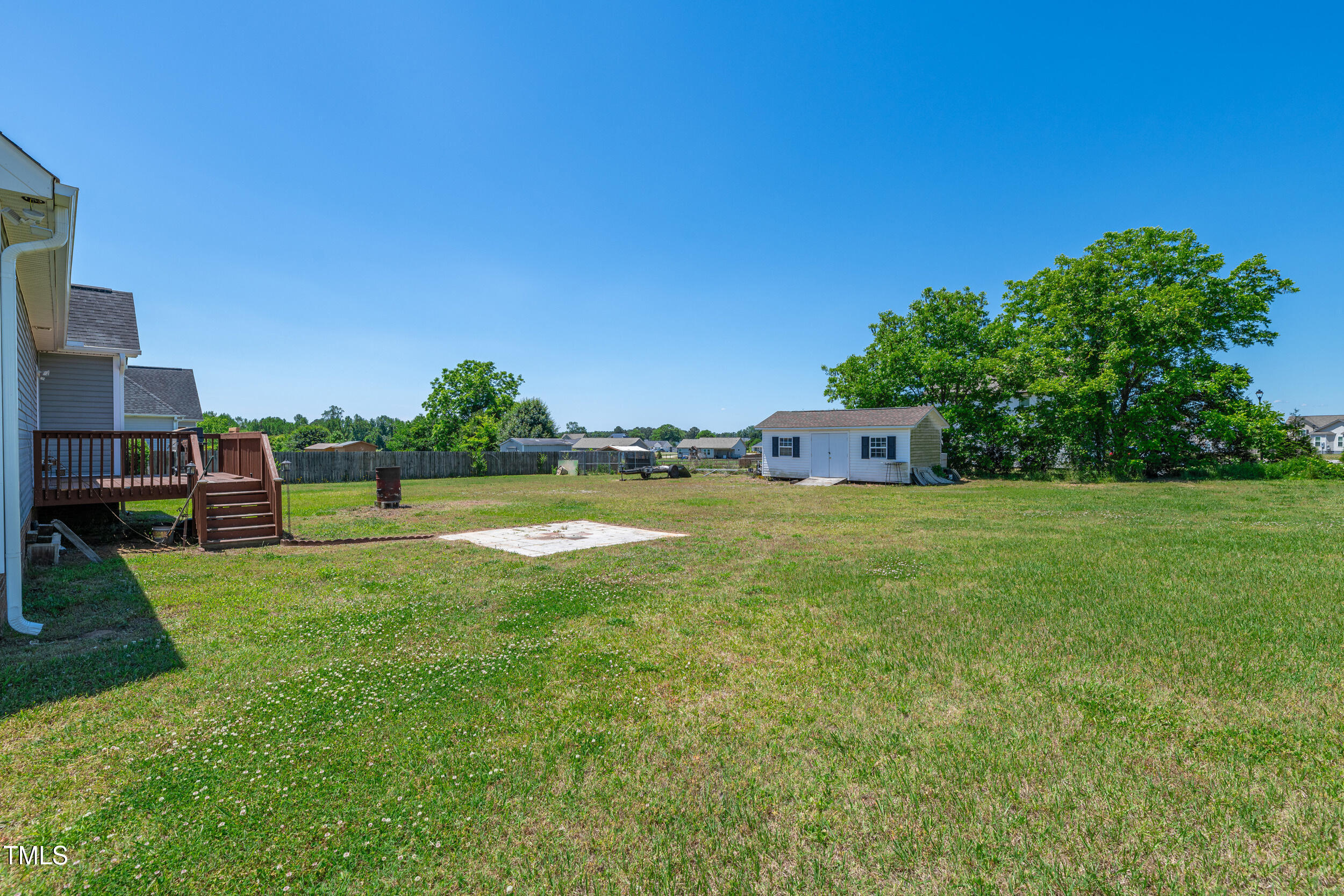 104 JJ Drive Benson, NC 27504 - Photo 18 of 20 a view of a house with a big yard