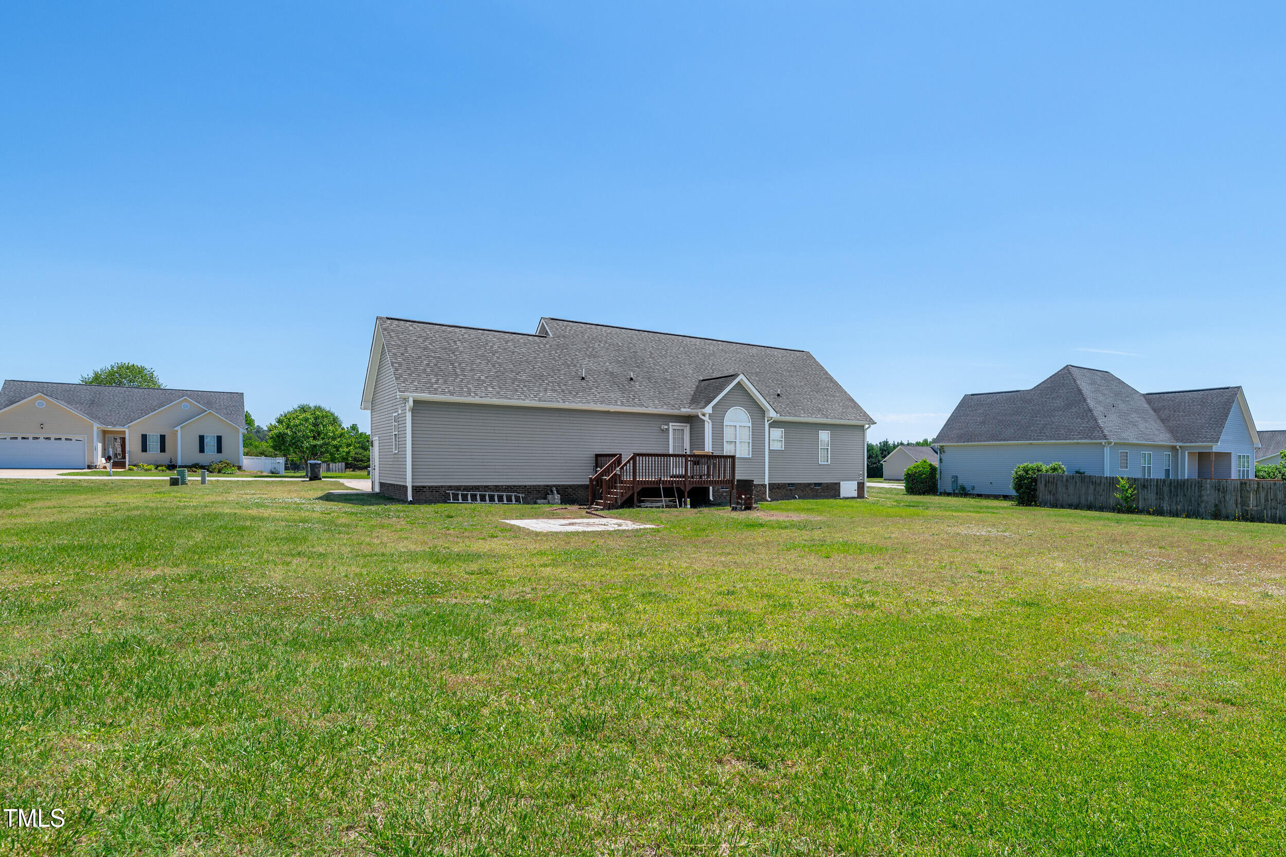 104 JJ Drive Benson, NC 27504 - Photo 19 of 20 a house view with a garden space