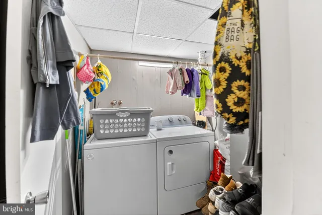 a utility room with dryer and washer