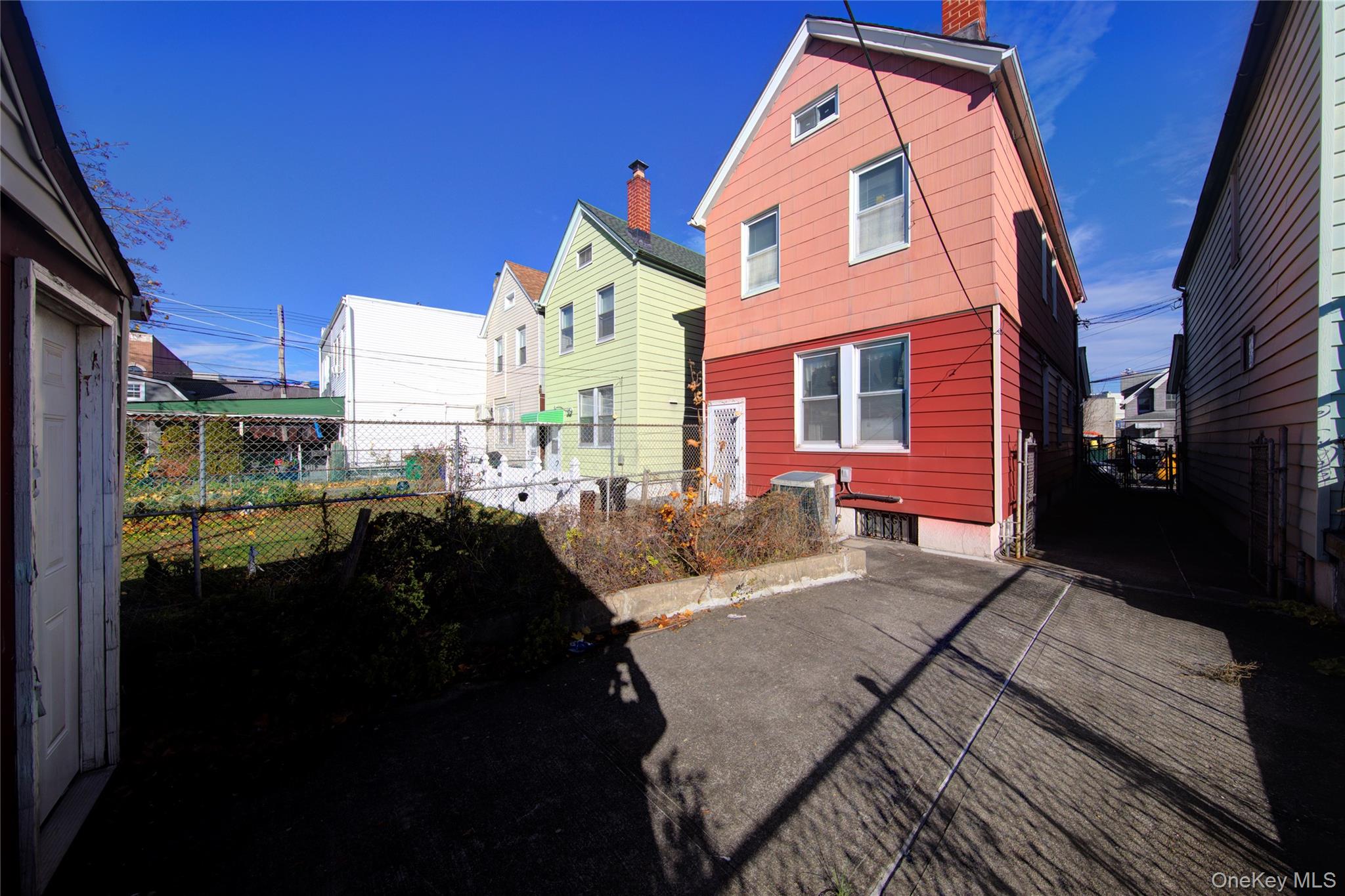 89-10 121st Street Queens, NY 11418 - Photo 24 of 25 a view of a house with a patio