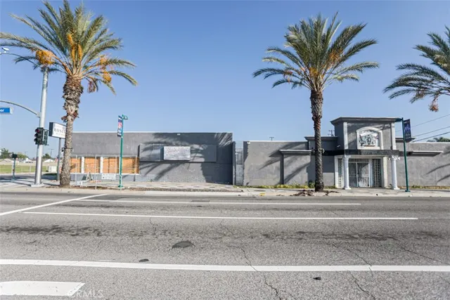 a view of multiple houses with a street