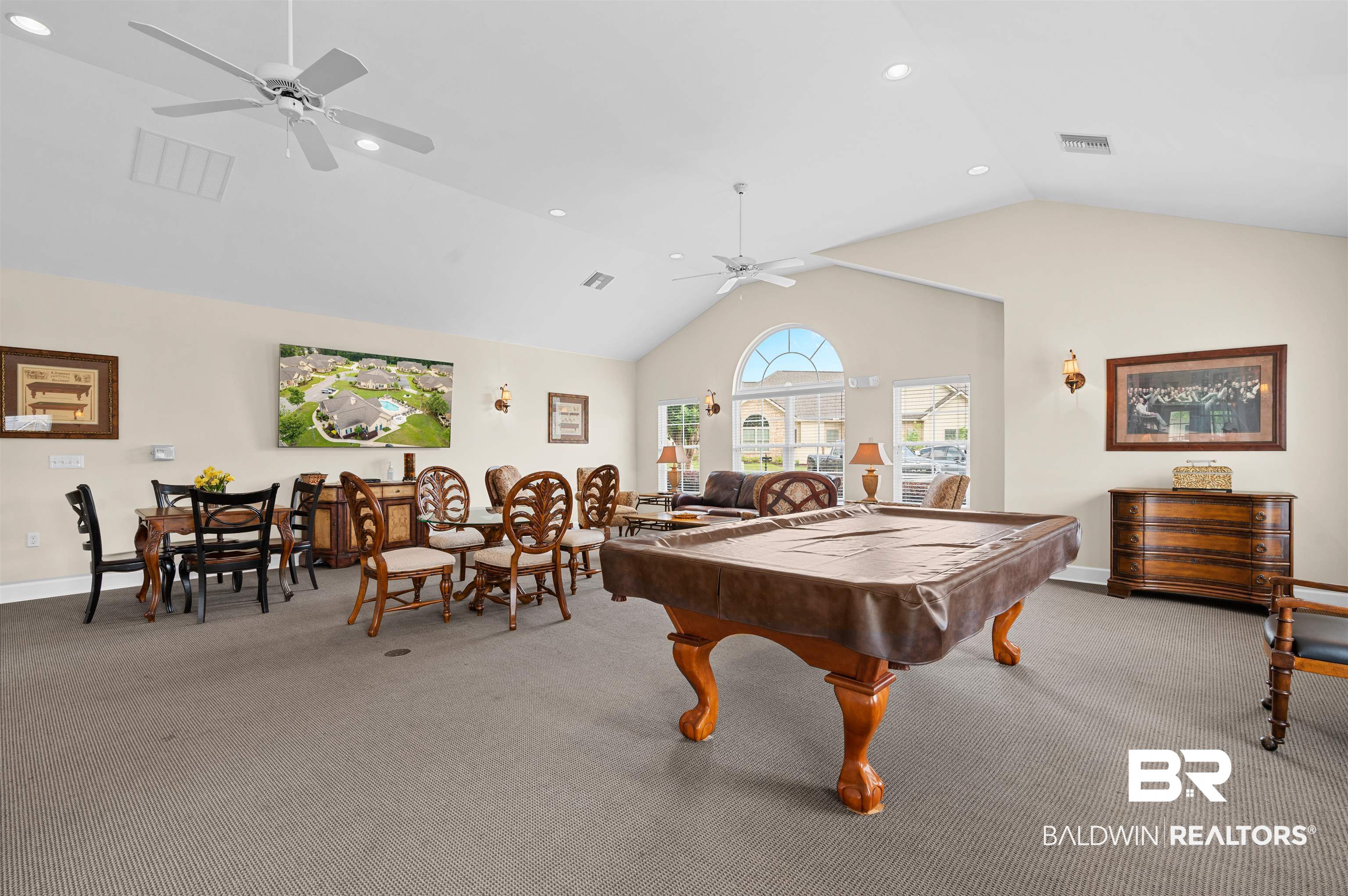 702 Holmes Avenue, Unit 702 Foley, AL 36535 - Photo 24 of 33 Rec room featuring billiards, ceiling fan, vaulted ceiling, and light colored carpet