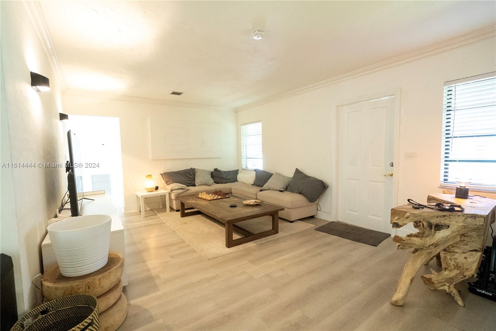 785 Fernwood Road Key Biscayne, FL 33149 - Photo 4 of 44 a living room with furniture and a window