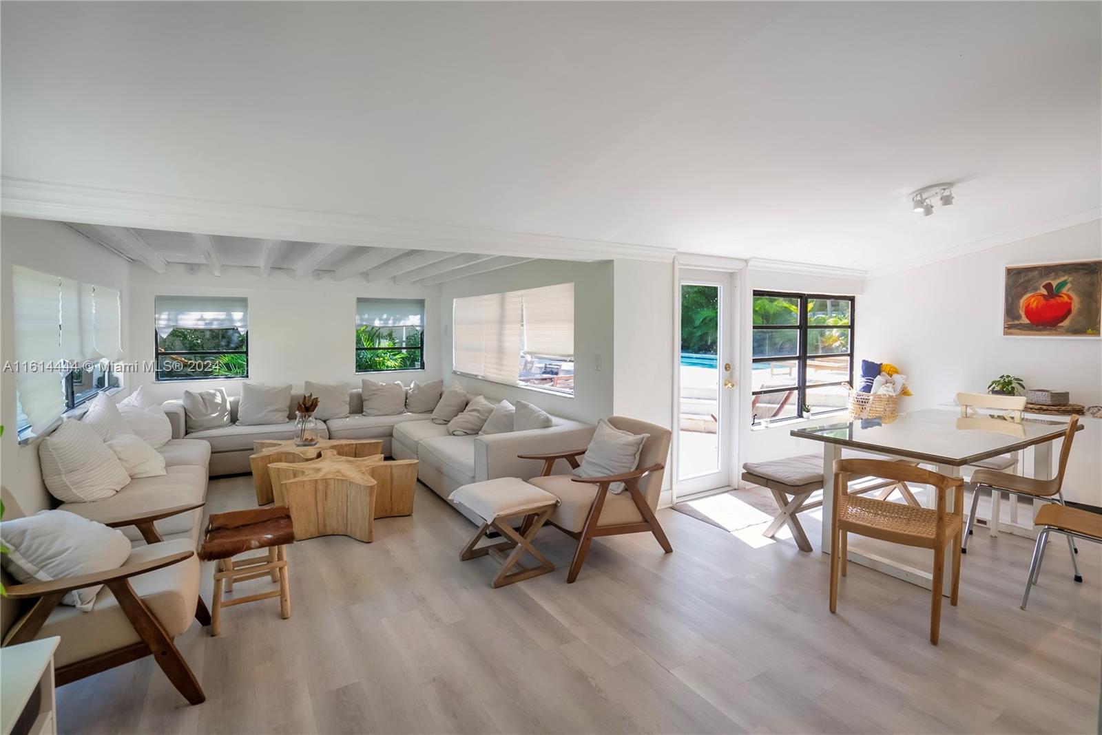 785 Fernwood Road Key Biscayne, FL 33149 - Photo 5 of 44 a living room with furniture and a wooden floor