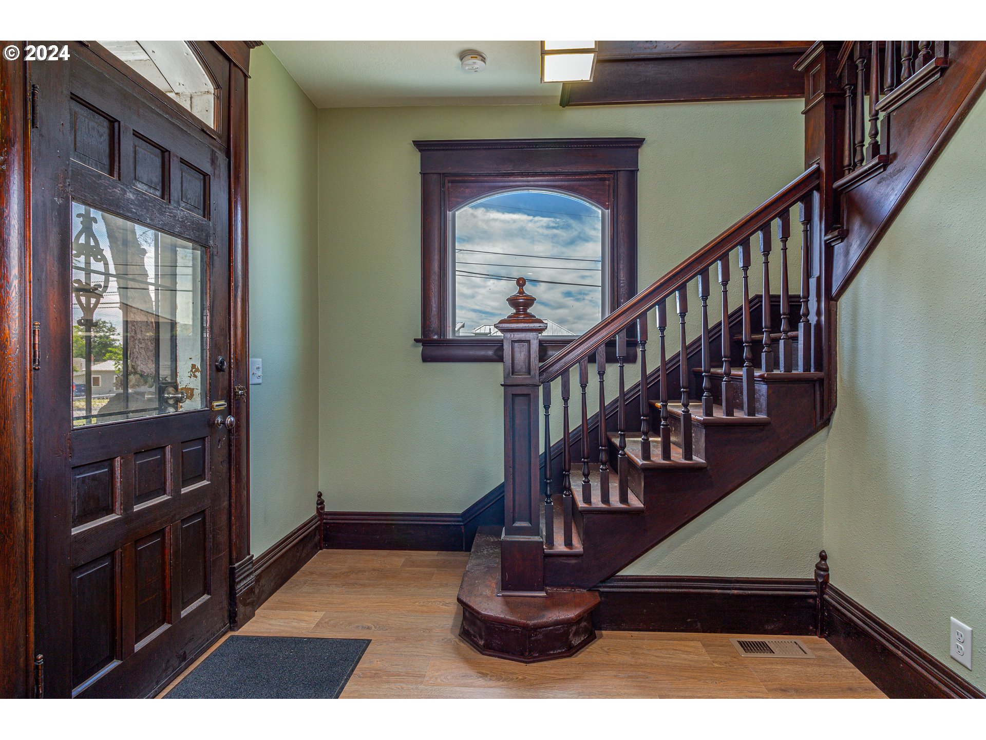 235 Northeast 3rd Street Hermiston, OR 97838 - Photo 14 of 27 a view of entryway and hall with wooden floor