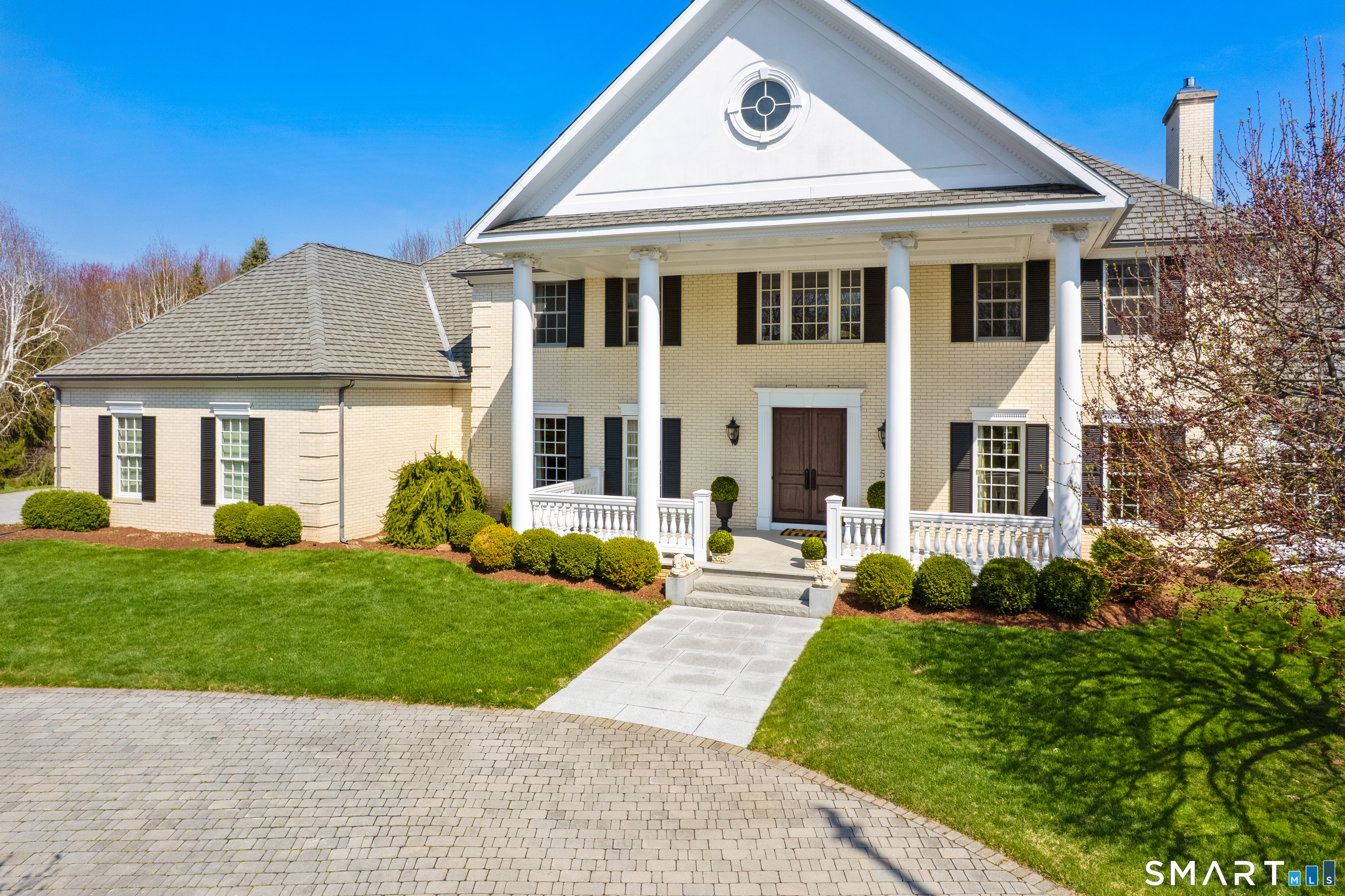 57 Thistledown Suffield, CT 06078 - Photo 2 of 39 a front view of a house with a yard