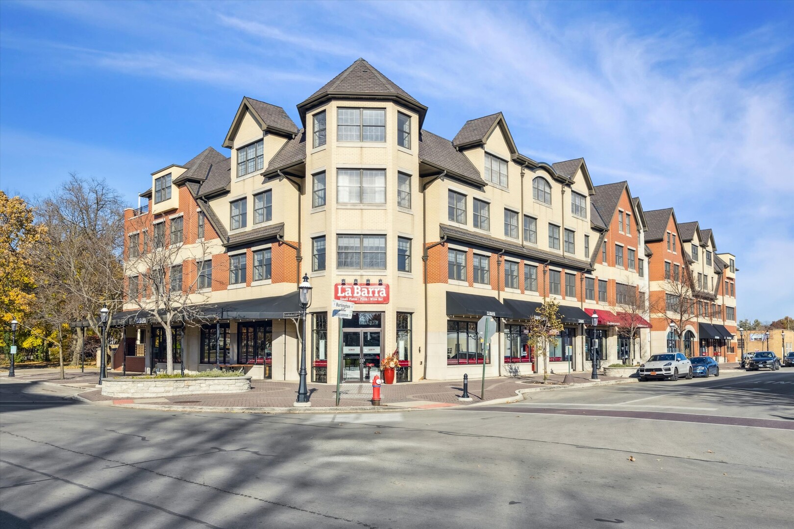 a front view of a building with street view and building