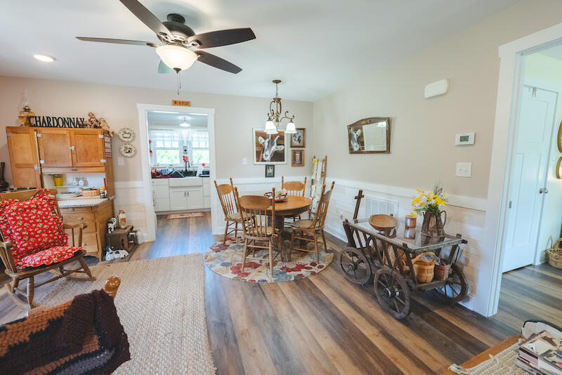 2598 Lone Ivy Road Stuart, VA 24171 - Photo 16 of 26 a living room with furniture and a wooden floor